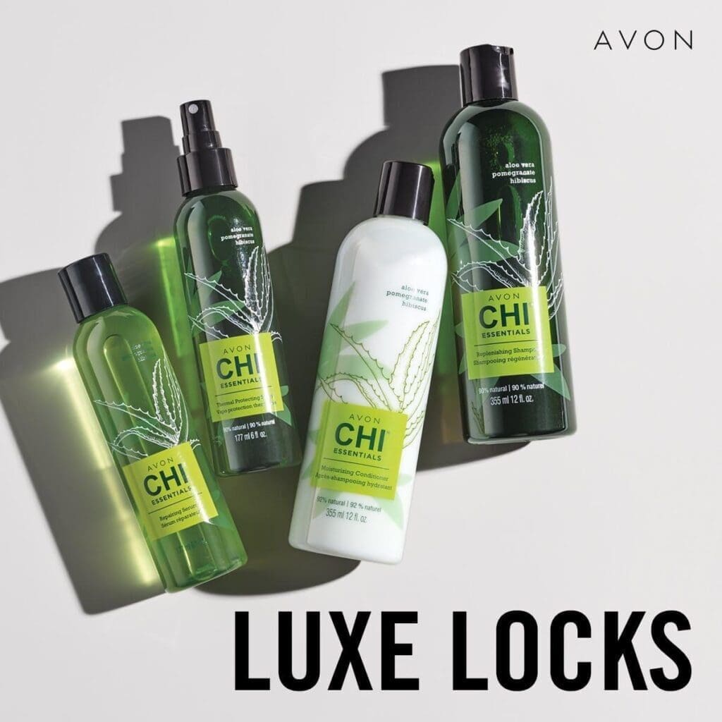 A group of avon products on top of a white table.