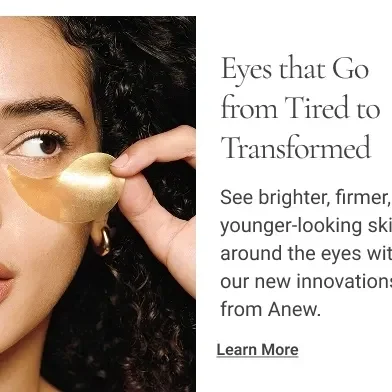 Woman applying under-eye patch.